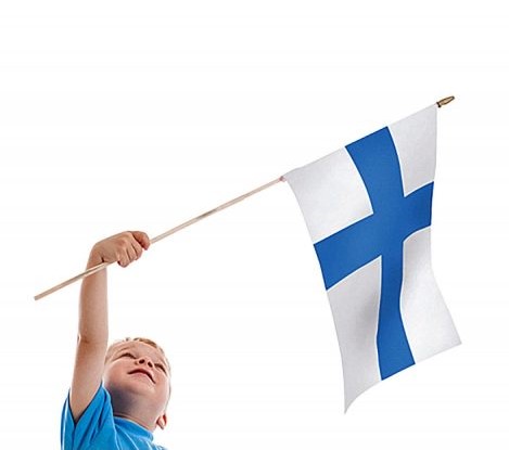 Lapsen päivän kekkerit Lapsi heiluttaa suomenlippua